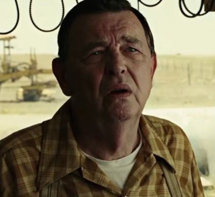 No Country For Old Men Movie: Gas Station Cashier White T-Shirt (L)