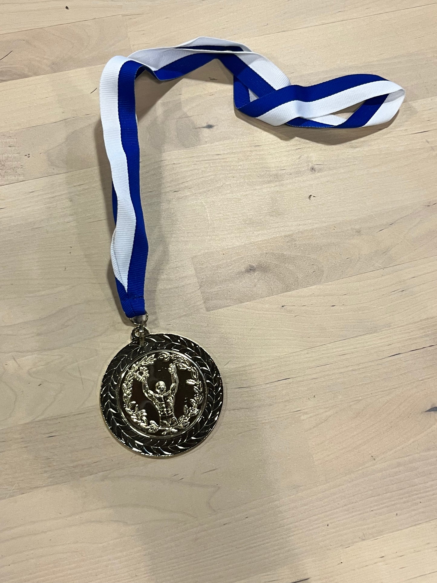 HOLLYWOOD PICTURES™: Battle of The Year Movie - Chris Brown’s Medal