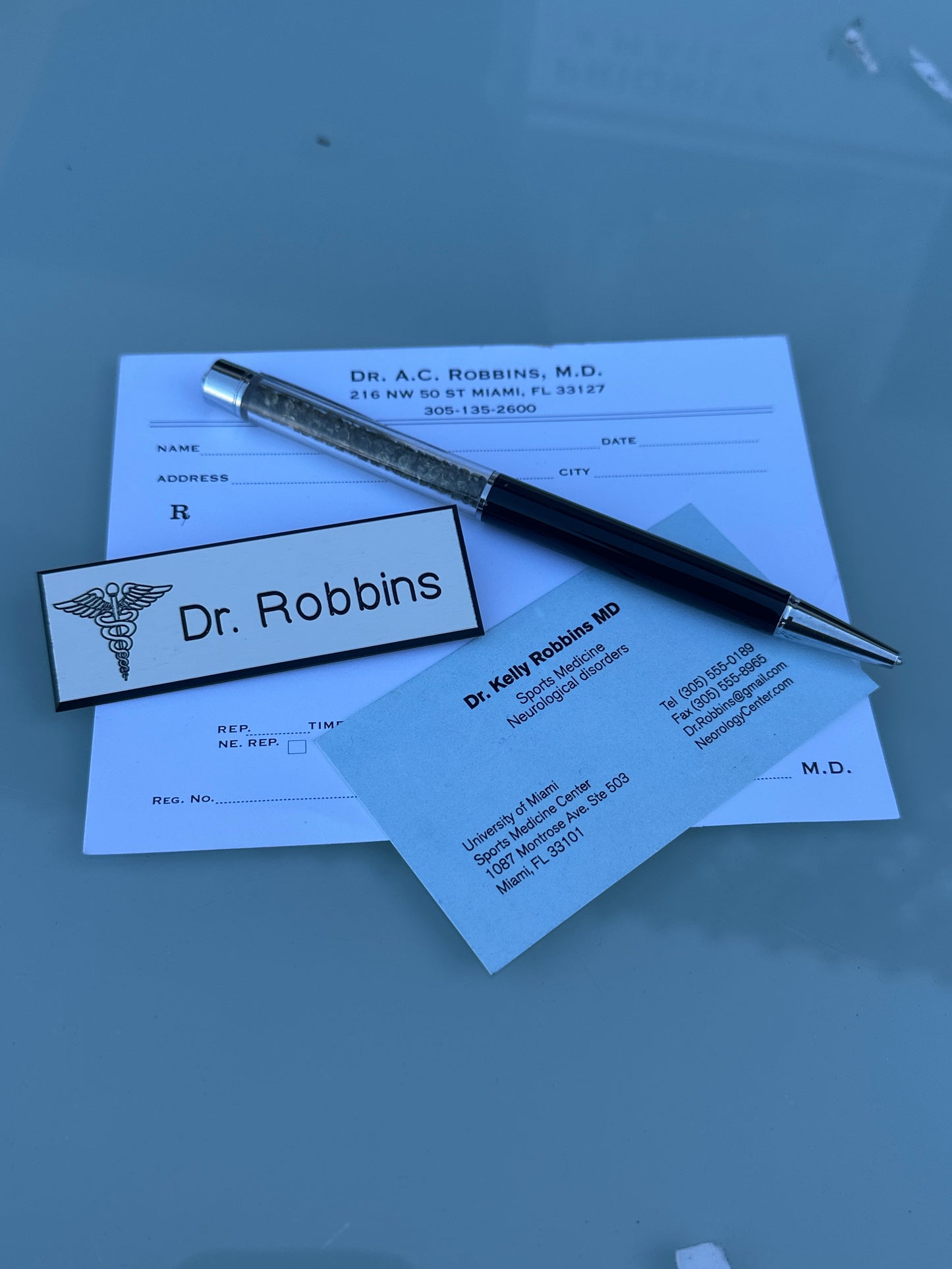 BALLERS: Dr Robbin’s HERO Card, Slip, Nameplate and Pen