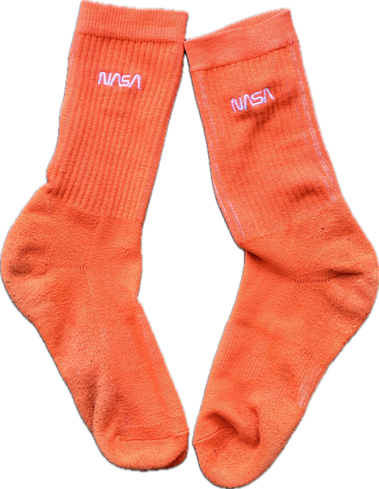 PARKS AND RECREATION: Tom’s Bright Orange Socks