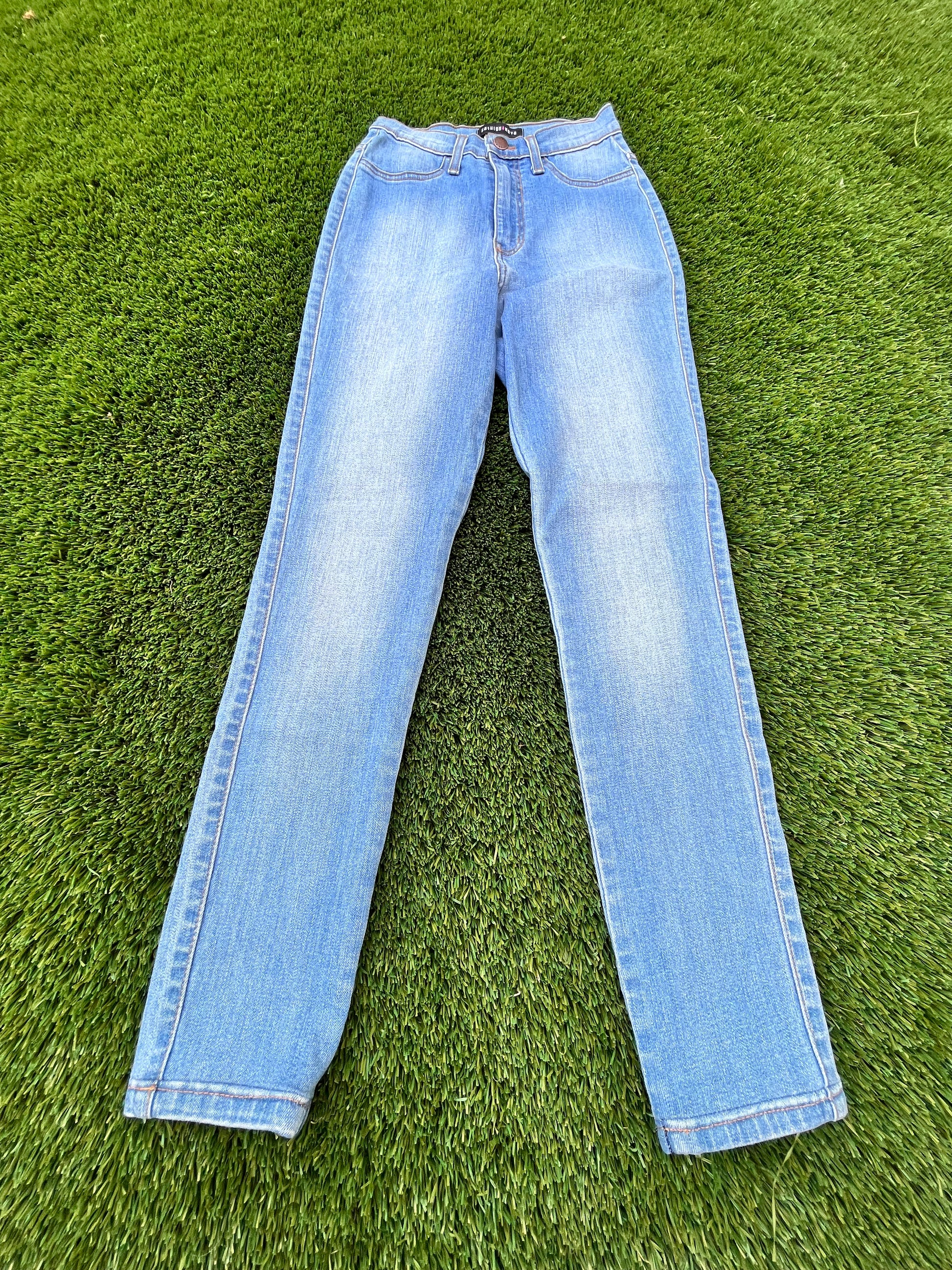TRUE BLOOD: Sookie's Blue Denim Jeans – HOLLYWOOD PICTURES STUDIOS, LLC.