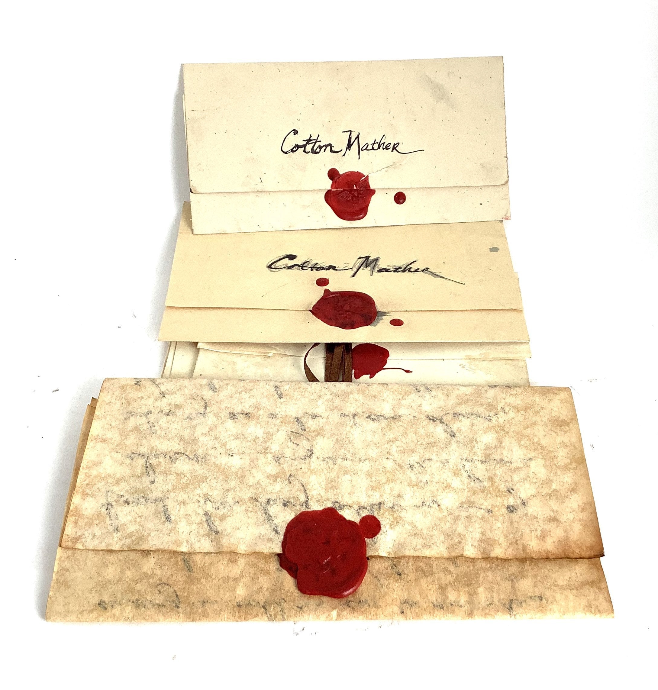 Salem: Cotton's Wax Stamped Letters – HOLLYWOOD PICTURES STUDIOS, LLC.